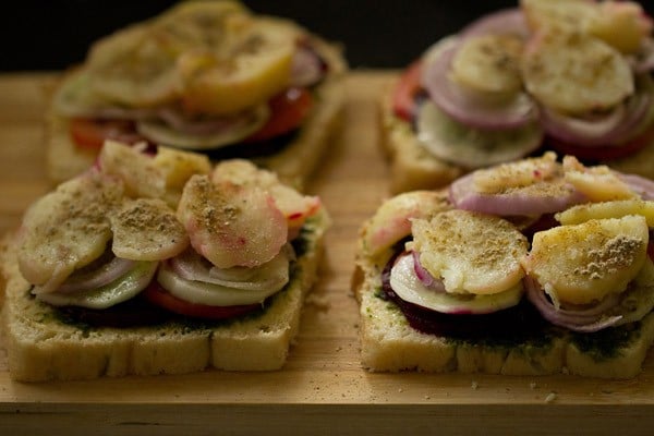 seasonings and spices sprinkled on top of boiled potato slices again. 