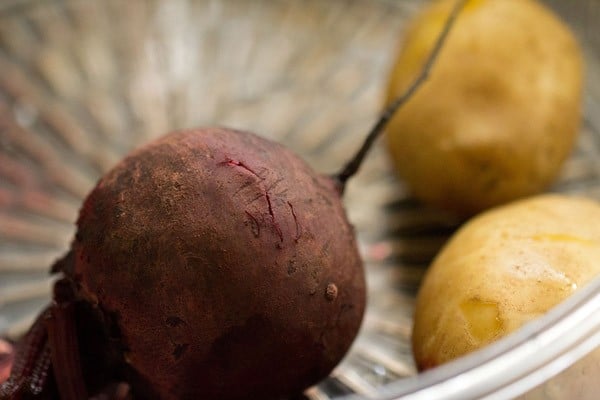 beetroot and potatoes in a steamer.