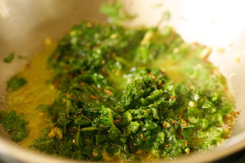 chopped spinach added and mixed with other ingredients. 