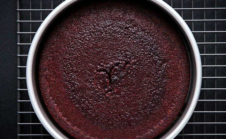 eggless chocolate cake in a tin after being baked