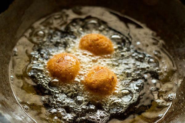 frying falafel till crisp and golden.