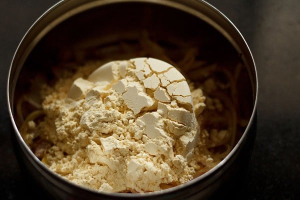 gram flour and baking soda added to spiced onion mixture. 
