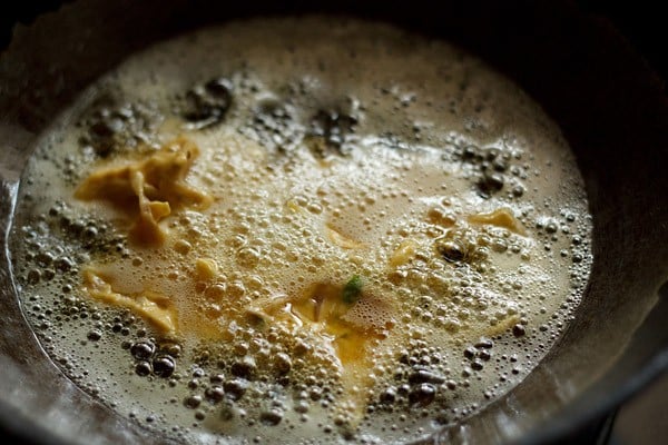 frying onion pakoda in hot oil. 
